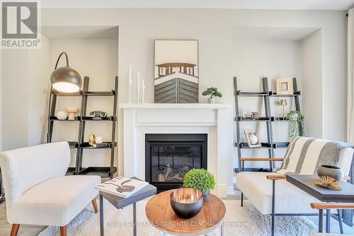 206 Cubitt Street, Clearview, ON - Indoor Photo Showing Living Room With Fireplace