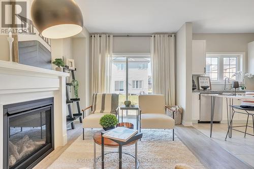 206 Cubitt Street, Clearview, ON - Indoor Photo Showing Living Room With Fireplace