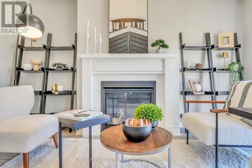 206 Cubitt Street, Clearview, ON - Indoor Photo Showing Living Room With Fireplace