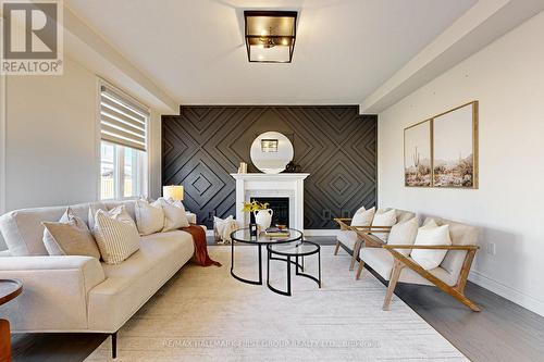 84 Grady Drive, Clarington, ON - Indoor Photo Showing Living Room With Fireplace