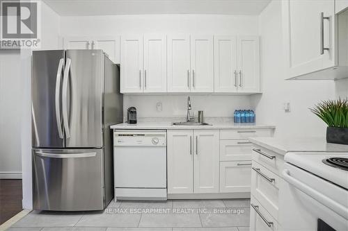 312 - 1450 Glen Abbey Gate, Oakville, ON - Indoor Photo Showing Kitchen