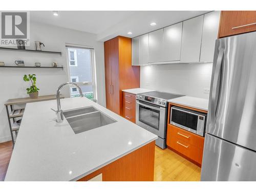 216 221 E 3Rd Street, North Vancouver, BC - Indoor Photo Showing Kitchen With Double Sink With Upgraded Kitchen