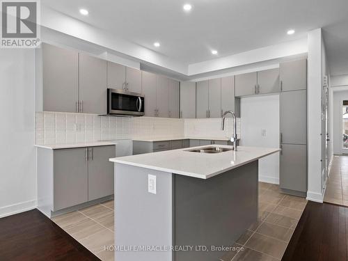 321 Makobe Lane E, Ottawa, ON - Indoor Photo Showing Kitchen With Double Sink