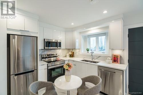 3087 Royal Oak Avenue, Burnaby, BC - Indoor Photo Showing Kitchen With Double Sink