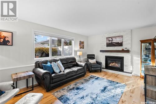 247 Briarvale Bay, Saskatoon, SK - Indoor Photo Showing Living Room With Fireplace