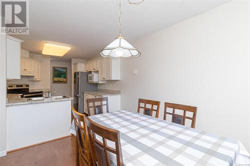 Dinning room looking into kitchen - 301 245 First St, Duncan, BC - Indoor Photo Showing Other Room