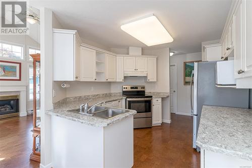 Kitchen updated fridge, stove and countertops - 301 245 First St, Duncan, BC - Indoor Photo Showing Kitchen With Double Sink With Upgraded Kitchen