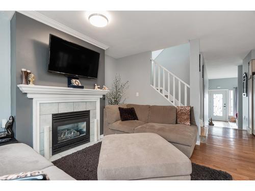 49 8888 216 Street, Langley, BC - Indoor Photo Showing Living Room With Fireplace