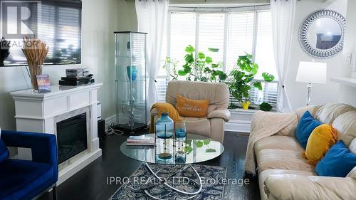 11 Unser Gate, Toronto, ON - Indoor Photo Showing Living Room With Fireplace