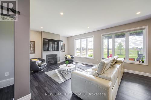 3559 Mia Lane, Plympton-Wyoming, ON - Indoor Photo Showing Living Room With Fireplace