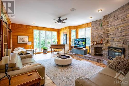 2845 Front Road, East Hawkesbury, ON - Indoor Photo Showing Living Room With Fireplace