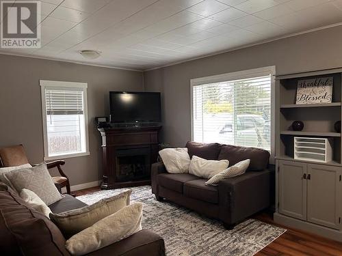 379 Connaught Street, Vanderhoof, BC - Indoor Photo Showing Living Room With Fireplace