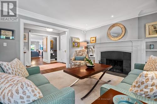 23 Cornish Road, Toronto, ON - Indoor Photo Showing Living Room With Fireplace