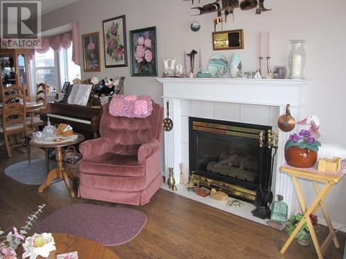 4 500 Wotzke Drive, Williams Lake, BC - Indoor Photo Showing Living Room With Fireplace