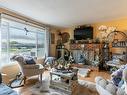 3772 Westsyde Rd, Kamloops, BC  - Indoor Photo Showing Living Room With Fireplace 