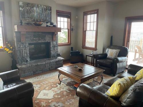 Living room - 360 Allée De L'Aventure, Mont-Tremblant, QC - Indoor Photo Showing Living Room With Fireplace