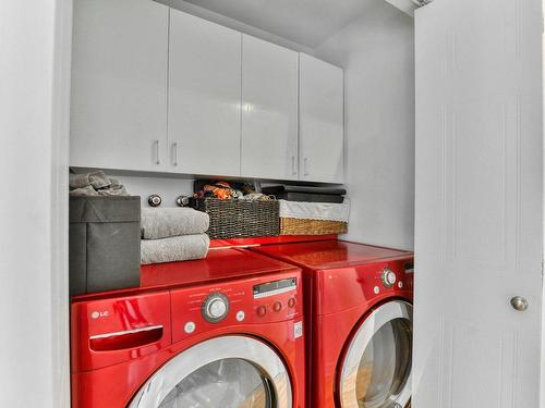 Salle de lavage - 302-222 Rue Larivière, Laval (Sainte-Dorothée), QC - Indoor Photo Showing Laundry Room