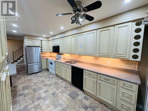 1388 Stonecutter Drive, Oakville, ON - Indoor Photo Showing Kitchen With Double Sink