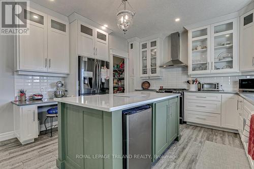 Kitchen cabinets to ceiling with glass doors - 185 Spencer Avenue, Lucan Biddulph (Lucan), ON - Indoor Photo Showing Kitchen With Upgraded Kitchen