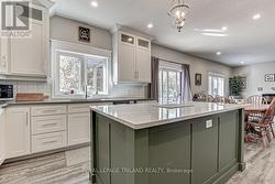 View of Kitchen window to back yard - 