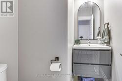 Main floor 2 pc. powder room - 