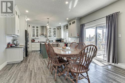 Eating area to covered deck - 185 Spencer Avenue, Lucan Biddulph (Lucan), ON - Indoor Photo Showing Dining Room