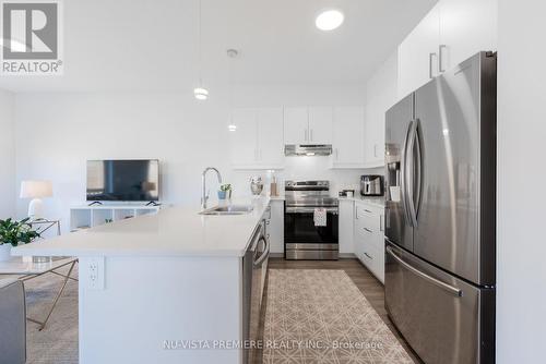 20 - 3635 Southbridge Avenue, London, ON - Indoor Photo Showing Kitchen With Double Sink With Upgraded Kitchen