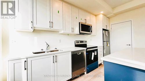 603 - 160 Densmore Road, Cobourg, ON - Indoor Photo Showing Kitchen With Double Sink