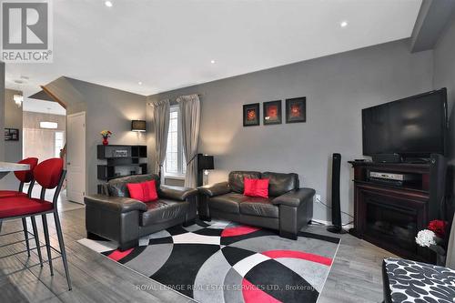 90 Palacebeach Trail, Hamilton, ON - Indoor Photo Showing Living Room With Fireplace