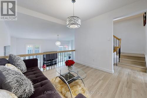 566 Sandhurst Circle, Toronto, ON - Indoor Photo Showing Living Room