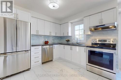 566 Sandhurst Circle, Toronto, ON - Indoor Photo Showing Kitchen