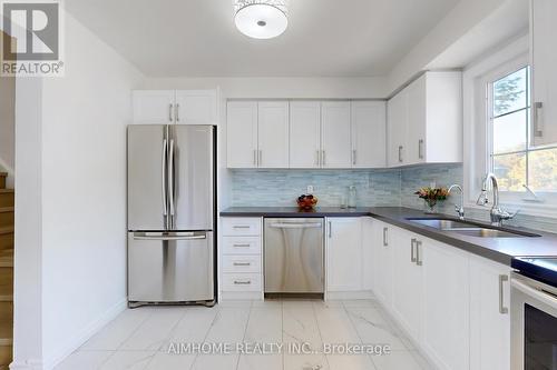 566 Sandhurst Circle, Toronto, ON - Indoor Photo Showing Kitchen With Double Sink With Upgraded Kitchen