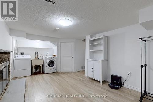 566 Sandhurst Circle, Toronto, ON - Indoor Photo Showing Laundry Room