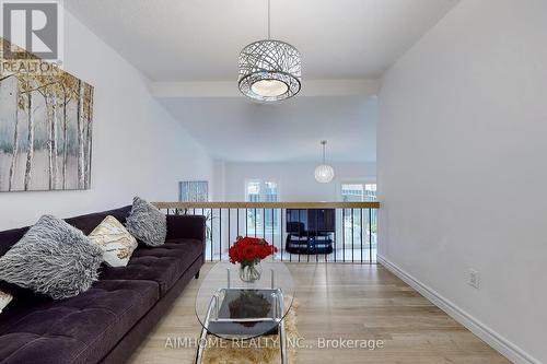 566 Sandhurst Circle, Toronto, ON - Indoor Photo Showing Living Room