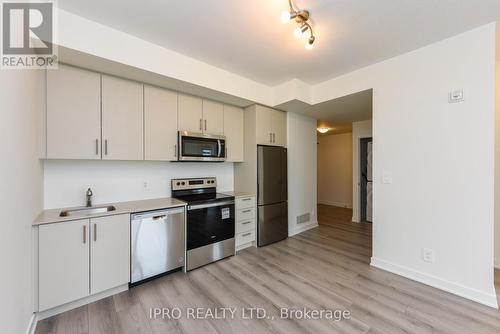 407 - 1440 Clarriage Court, Milton, ON - Indoor Photo Showing Kitchen With Stainless Steel Kitchen