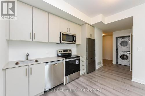 407 - 1440 Clarriage Court, Milton, ON - Indoor Photo Showing Kitchen With Stainless Steel Kitchen