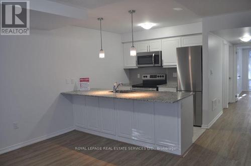 102 - 32 Fieldway Road, Toronto, ON - Indoor Photo Showing Kitchen