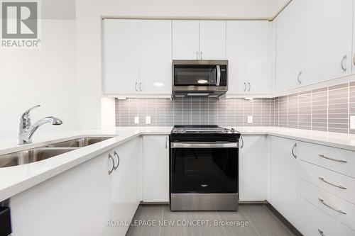 705 - 4955 Yonge Street, Toronto, ON - Indoor Photo Showing Kitchen With Double Sink With Upgraded Kitchen