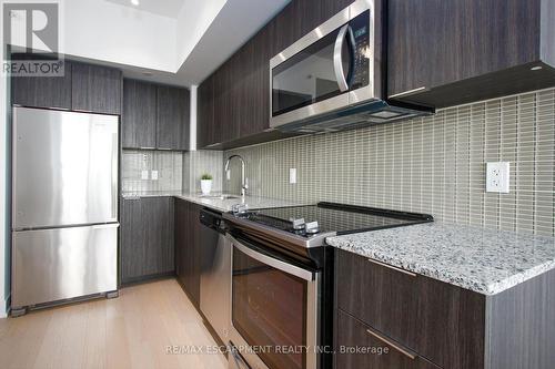 2306 - 20 Shore Breeze Drive, Toronto, ON - Indoor Photo Showing Kitchen With Upgraded Kitchen