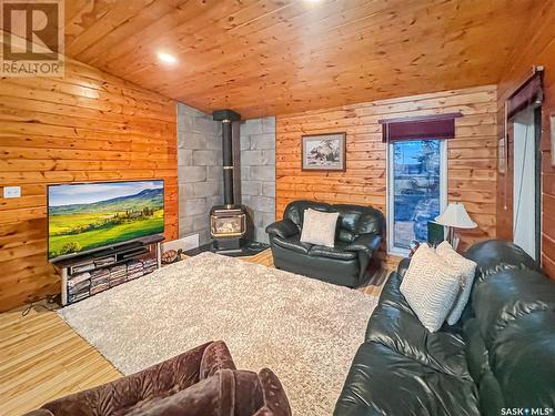 9 Norland Place, Candle Lake, SK - Indoor Photo Showing Living Room With Fireplace