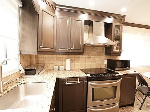 Cuisine - 5222 Rue Chabanel, Laval (Chomedey), QC - Indoor Photo Showing Kitchen