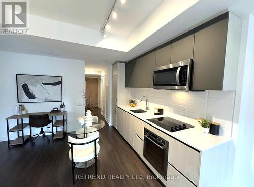 434 - 150 Logan Avenue, Toronto, ON - Indoor Photo Showing Kitchen With Upgraded Kitchen