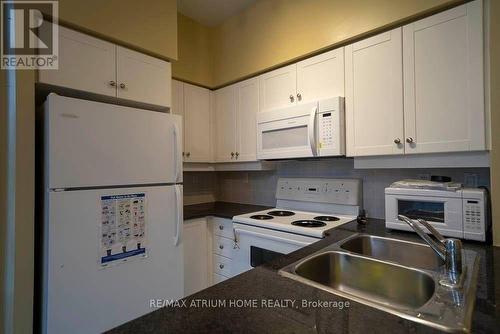 106 - 19 Barberry Place, Toronto, ON - Indoor Photo Showing Kitchen With Double Sink