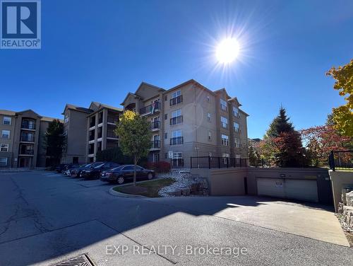 204 - 1350 Main Street E, Milton, ON - Outdoor With Facade