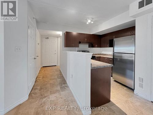 204 - 1350 Main Street E, Milton, ON - Indoor Photo Showing Kitchen