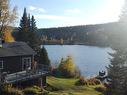 Bord de l'eau - 141 Ch. Du Lac-St-Louis E., Saint-Zénon, QC  - Outdoor With Body Of Water With View 