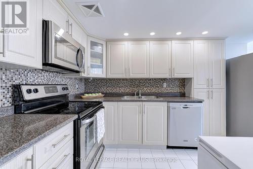 1210 - 350 Webb Drive, Mississauga, ON - Indoor Photo Showing Kitchen With Double Sink