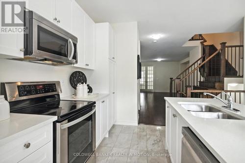 3946 Tufgar Crescent, Burlington, ON - Indoor Photo Showing Kitchen With Double Sink