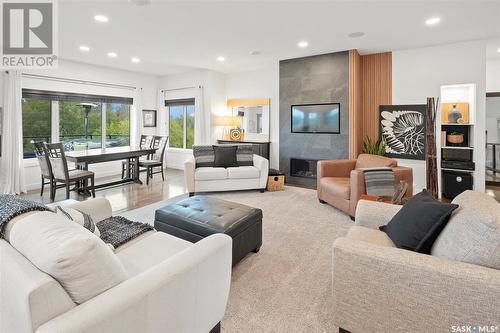 731 Beechdale Way, Saskatoon, SK - Indoor Photo Showing Living Room With Fireplace