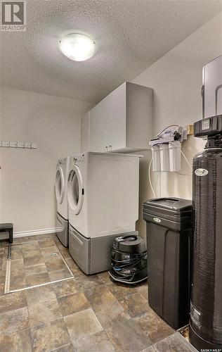 10 702 Mesa Way, Shellbrook, SK - Indoor Photo Showing Laundry Room